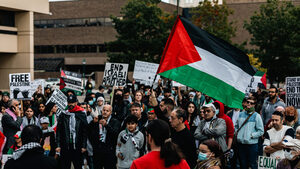 Rally participants called for a cease-fire in the Israel-Palestine conflict and an end to U.S. military aid to Israel. The rally was organized by Justice for Palestine, a committee of the Syracuse Peace Council, and the Syracuse chapters of the Party for Socialism and Liberation and the Democratic Socialists of America.
